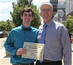 Shamus holding award certificate with and Davey