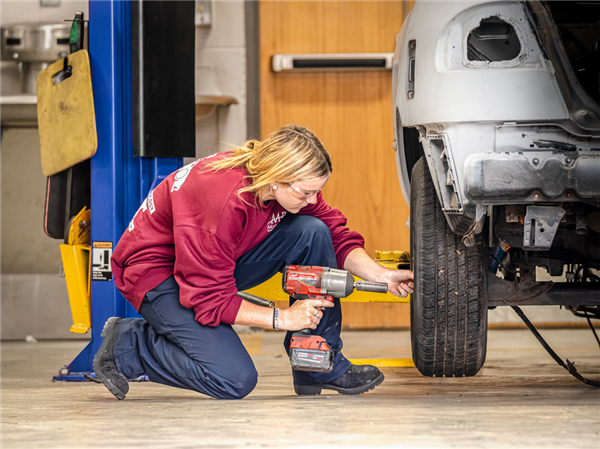 Automotive Technology student working on cars